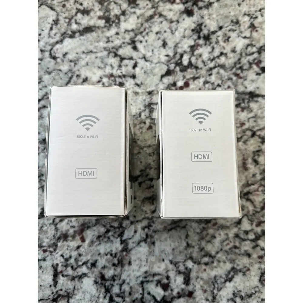 2 empty Apple TV boxes no Apple TV included